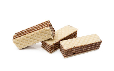 Crispy wafers with creamy hazelnut filling isolated on white background