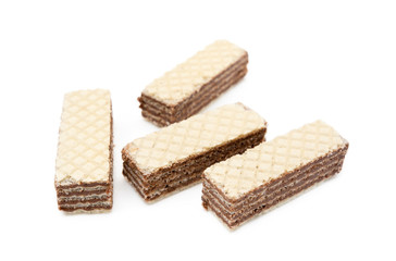 Crispy wafers with creamy hazelnut filling isolated on white background