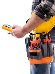 Electrician with tool belt on a white background. Electricity.