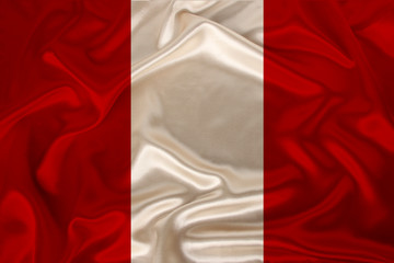 photo of the national flag of Peru on a luxurious texture of satin, silk with waves, folds and highlights, closeup, copy space, travel concept, economy and state policy, illustration