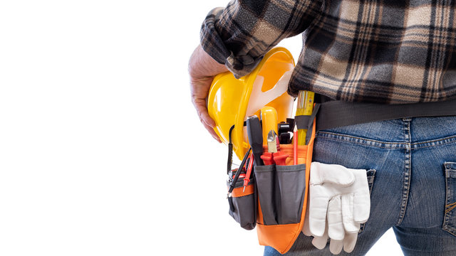 Electrician with tool belt on a white background. Electricity.