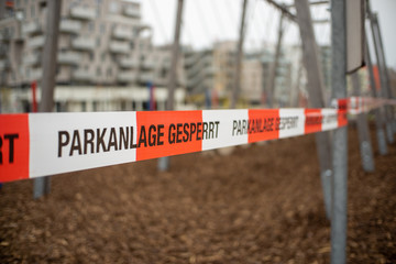 Vienna, Austria - 03.17.2020 Playground closed due due Corona virus crisis. German words „Parkanlage gesperrt“ means Playground is closed.