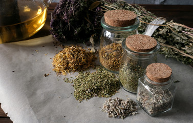 Homemade apothecary. Natural herbs medicinal. Dried herbs in glass jars. Various kinds of herbal tea.