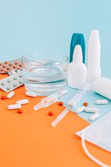 Set of pills and bottles of nose drops for treatment various viruses symptoms. Treatment of...