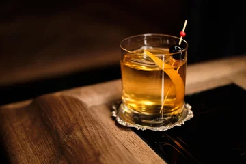 Fotobehang Perfect Old Fashioned cocktail with cherry and orange zest © Mykola Khalavka