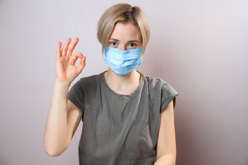 Girl with mask to protect her from Corona virus. Corona virus pandemic. woman wearing a face mask, wearing mask concept