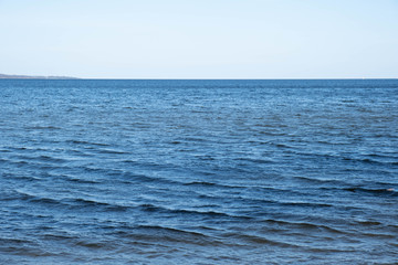 Obraz premium in the distance an exit to the endless blue sea