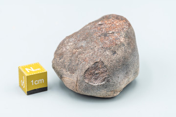 Chondrite Meteorite L6W2 Type isolated, piece of rock formed as an asteroid in the universe at during Solar System creation. The meteorite comes from an asteroid fall impacting Earth at Atacama Desert
