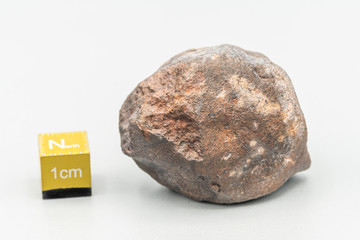 Chondrite Meteorite L6W2 Type isolated, piece of rock formed as an asteroid in the universe at during Solar System creation. The meteorite comes from an asteroid fall impacting Earth at Atacama Desert