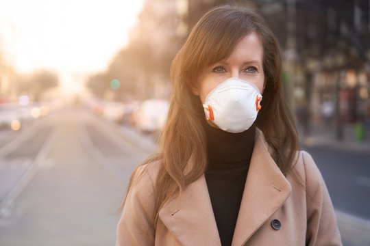 Coronavirus disease - woman wearing face mask