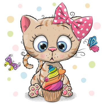 Kitten with cake and butterflies on a white background