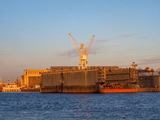 Obraz premium view of the cargo port with floating cranes