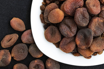 famous turkish dried apricots, sun dried apricots, malatya apricots, dried apricots, dried apricots on the plate,