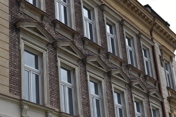 Fototapeta na wymiar Frontage and windows on historical building