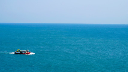 a tourist ship crossing the sea