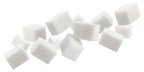 Flying sugar cubes, isolated on white background