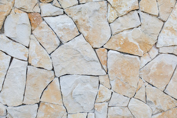 texture of large stones from which the fence is laid out