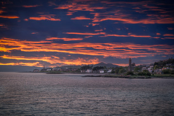 Naklejka premium Looking North To the Town of Largs at Sunset on the West Coast of Scotland