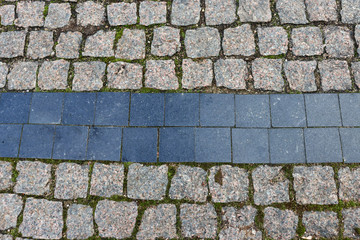 The texture of antique stone road. Medieval road