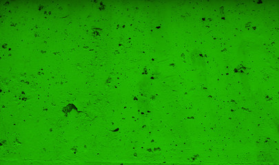 Light green background with holes for design. Bright green slightly uneven surface