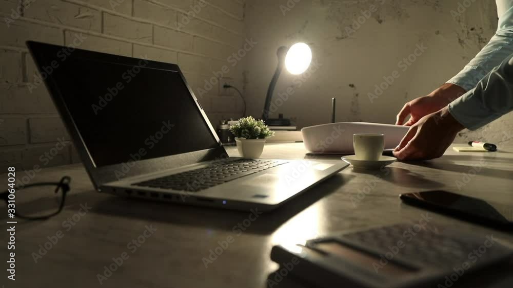 Poster man hand document with computer on table