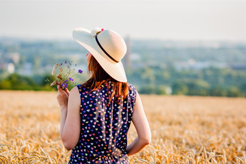 woman in wheat field