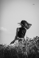 young woman in wheat field