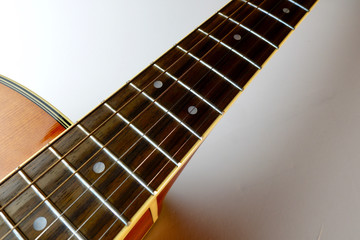 acoustic guitar closeup . White background with copy space