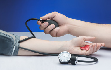 tonometer measures the pressure of woman a doctor appointment