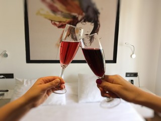 Chin-chin: toast and glasses of red wine, celebration. 