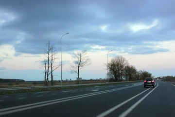 Fototapeta premium The car is driving on the road.