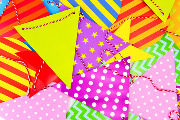 Obraz premium photo abstraction of paper flags on a red thread