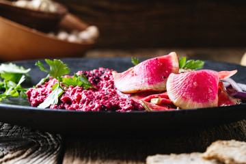 Beetroot horseradish  hummus with pickled watermelon radishes
