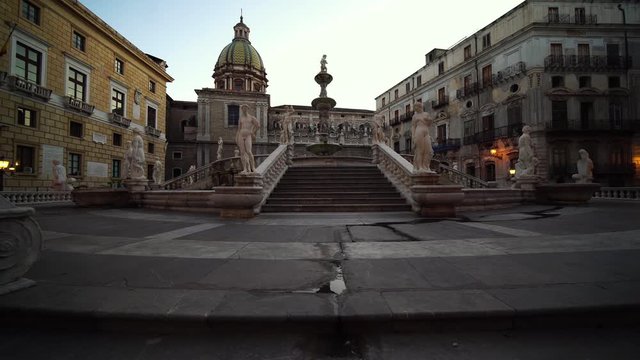 Piazza Pretoria fountain sculptures. Palermo, Sicily, Italy. Summer tourism landmark & family travel destination in Europe.