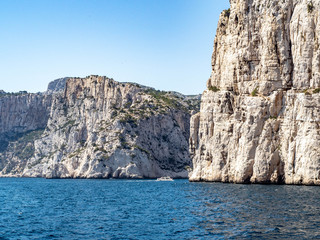 Fototapeta na wymiar Calanques or narrow inlets formed by steep limestone cliffs near Cassis on the French Riviera.