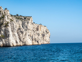 Fototapeta na wymiar Calanques or narrow inlets formed by steep limestone cliffs near Cassis on the French Riviera.