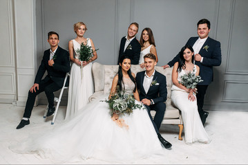Group wedding photo in the studio