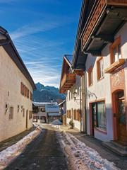 Sunlit narrow street in Garmisch Partenkirchen