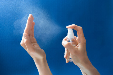Alcohol spray for disinfecting hand washing against viral bacteria. - obrazy, fototapety, plakaty