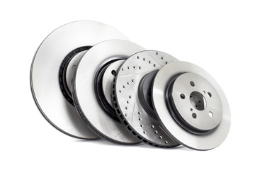 several different types of brake discs on a white background