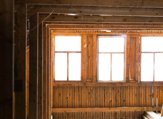 Obraz na płótnie Canvas the attic of a wooden house. sun light through window
