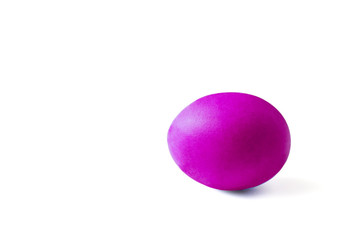 Easter pink-purple egg isolated on a white background.
