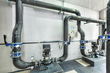 interior of an industrial boiler house, technological unit with many sensors, indicators and valves
