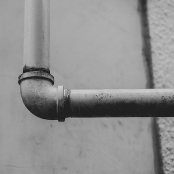 Close up of metal piping on building wall,Seattle