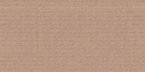 High resolution seamless cartboard background and texture hard paper sheet. Beige recycled eco carton paper or  seamless carton background.