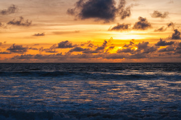 Magical dramatic sunset on a tropical beach.