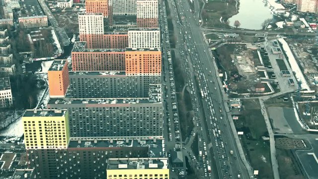 Aerial view of modern apartment houses and road traffic jam in Govorovo, Moscow. Russia