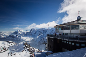 Beautiful alpine panorama on a sunny day from the top of Schilthorn, Switzerland, peak above...