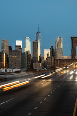 Fototapeta na wymiar Lower Manhattan Skyline from Brooklyn Bridge at Sunrise