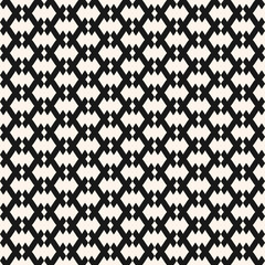 Vector geometric seamless pattern in traditional ethnic style. Tribal folk motif. Black and white ornament with small rhombuses, grid, net, lattice. Abstract monochrome background. Repeatable texture